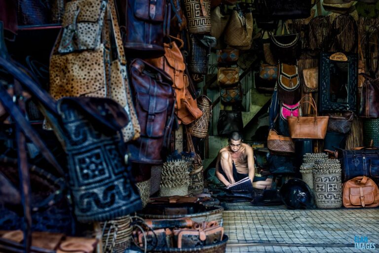 Basket maker at work in a shop in Ubud Bali