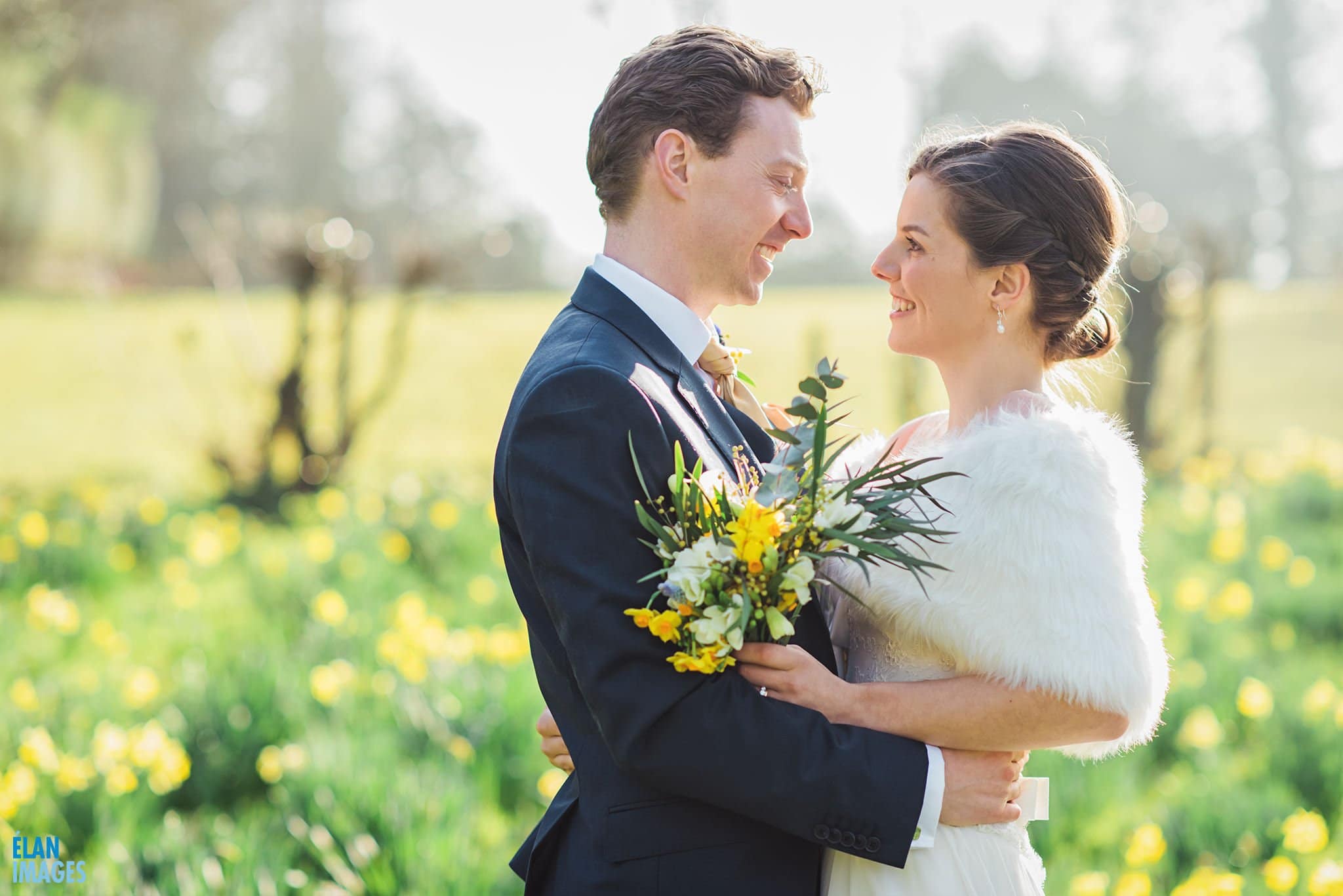 Bride and Groom in the Daffodils at Coombe Lodge