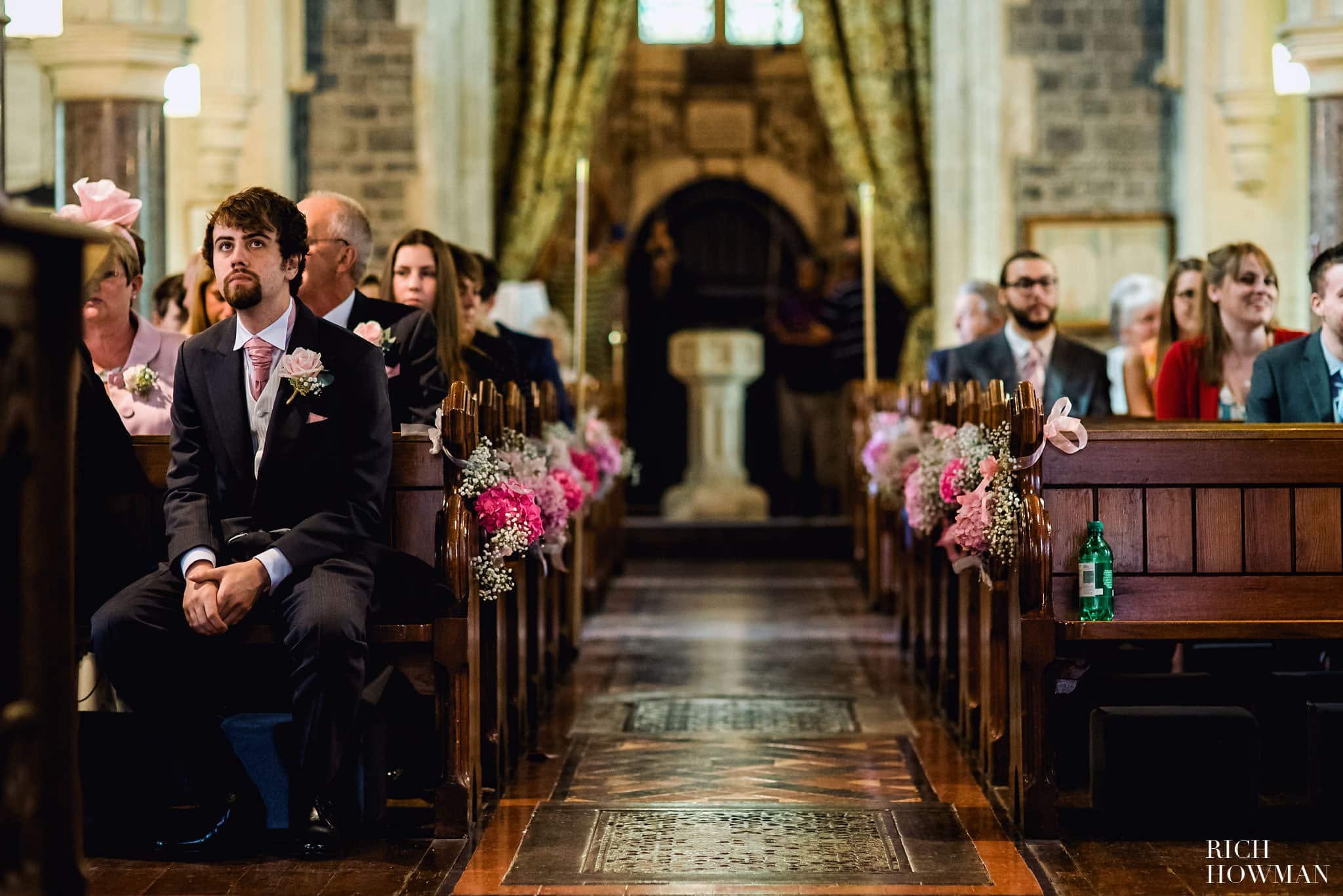 The Groom waits inside St. James' Church in Ashwick before his wedding