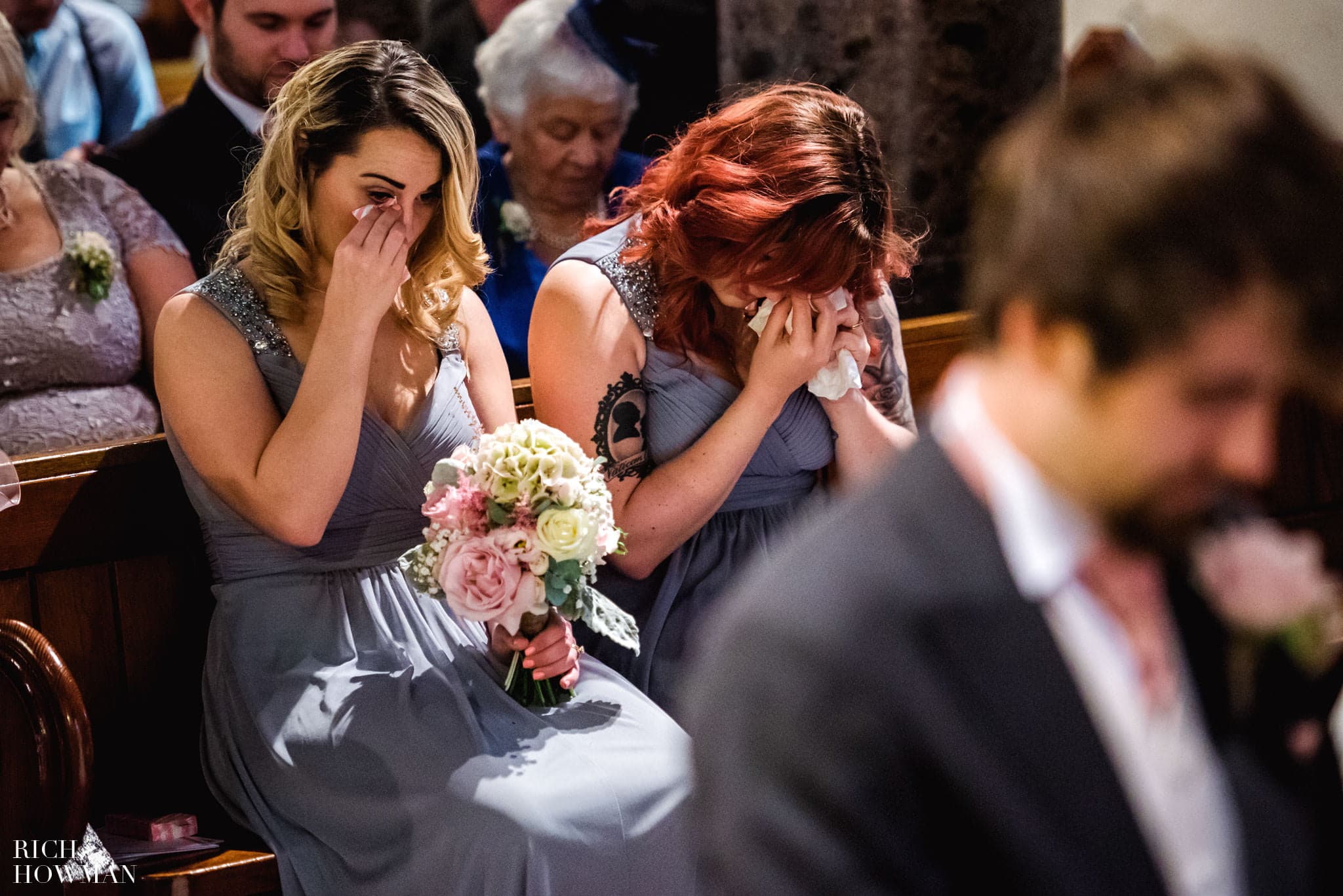 Bridesmaids crying in church