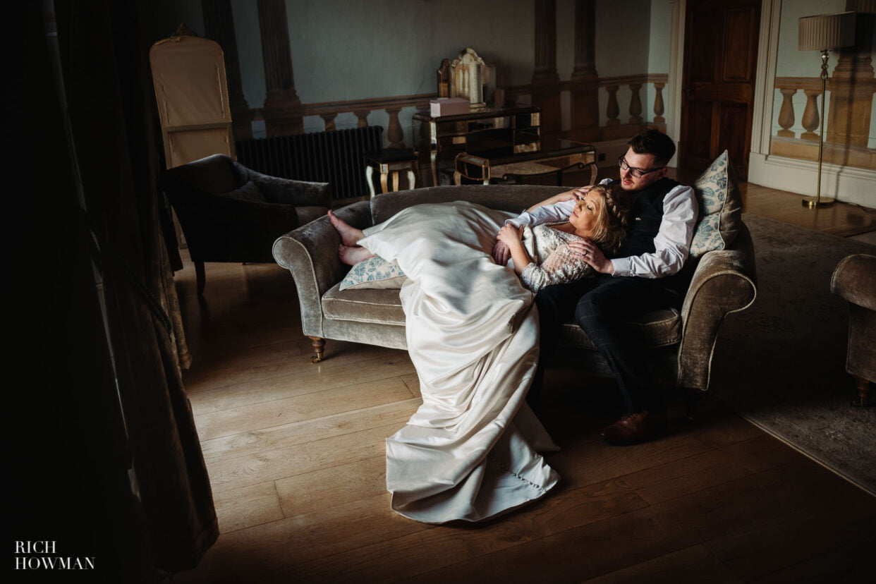 bride and groom portrait in window light by rockbeare manor wedding photographer, rich howman