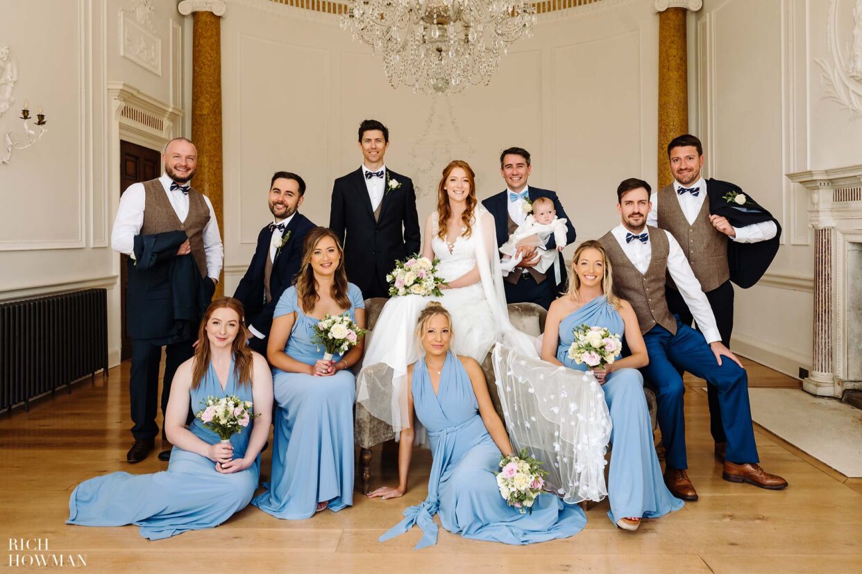 Group portrait of the bridal party by Rich Howman, Devon Wedding Photographer Rockbeare Manor