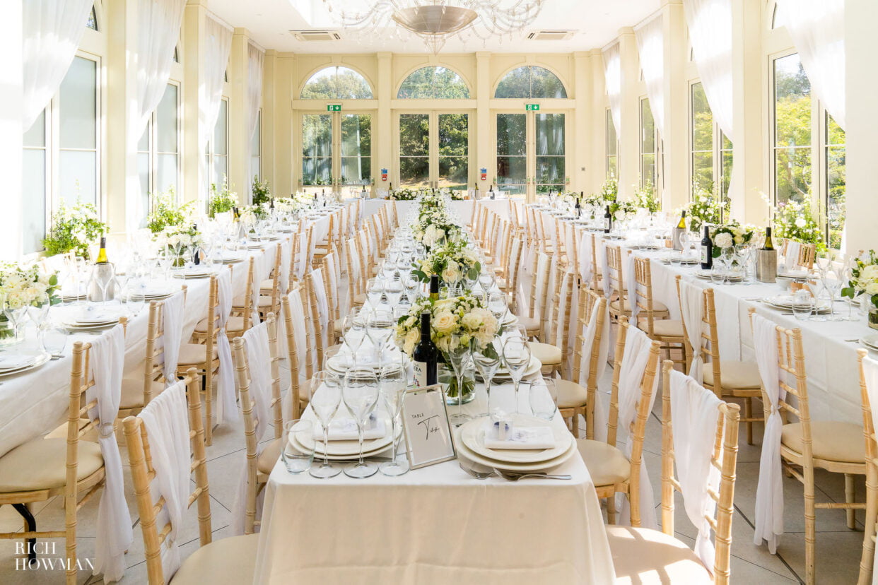 tables set up for a wedding ceremony, captured by Clevedon Hall wedding photographer, Rich Howman