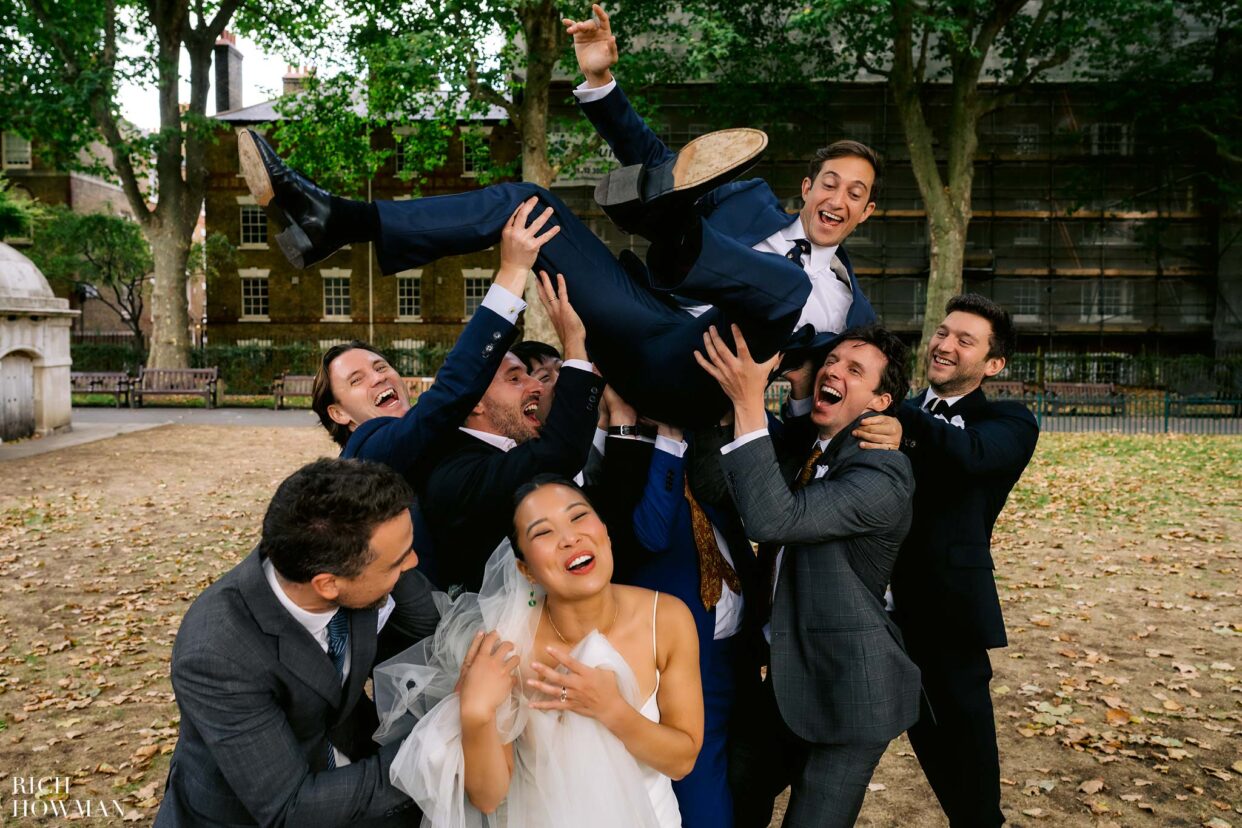 groom thrown in the air, captured by Jewish wedding photographer, rich howman