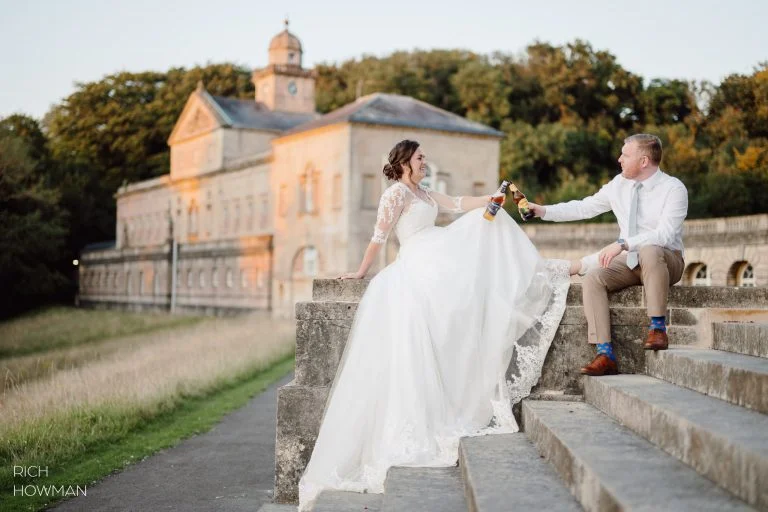 Prior Park Wedding Photographer in Bath - couple enjoy a cider together during their Prior Park Wedding in Bath